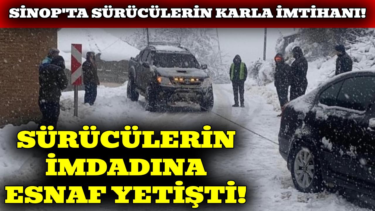 Sinop'ta karda mahsur kalan araçlara esnaf desteği