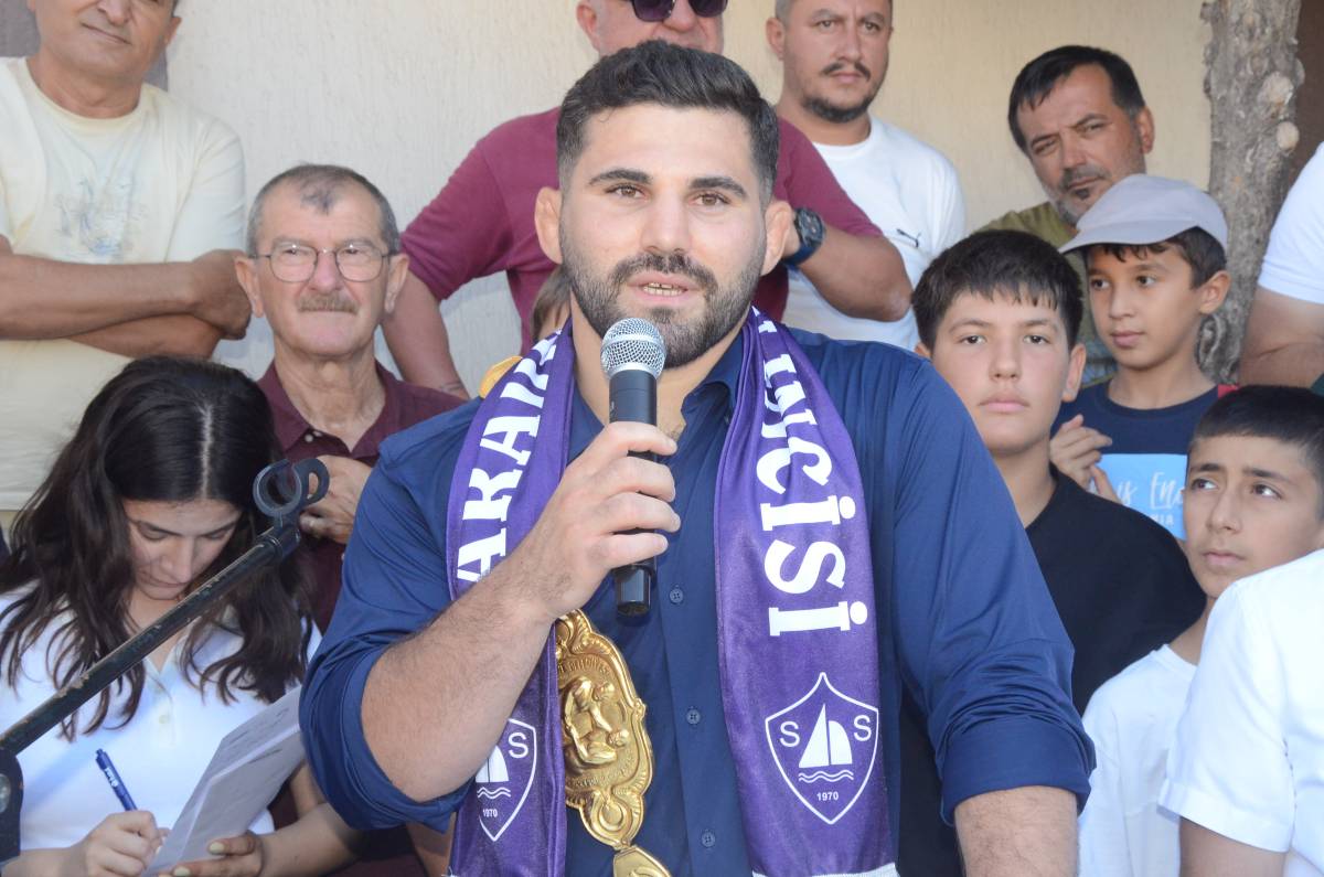 Başpehlivan Erkan Taş’a memleketinde görkemli karşılama